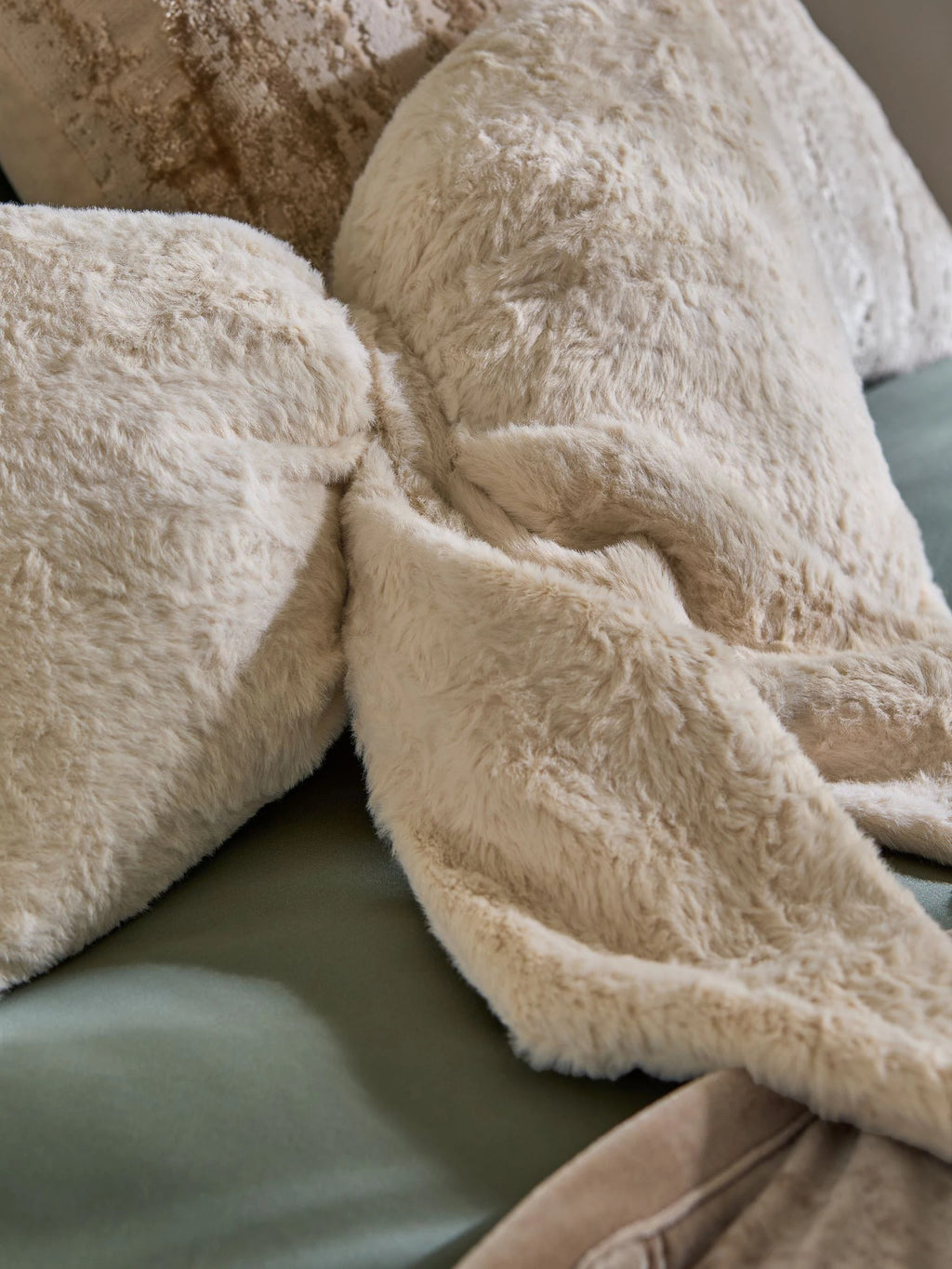 Natural 3D Faux Fur Bow Cushion Height 30cm  Width 40cm  Depth 10cm